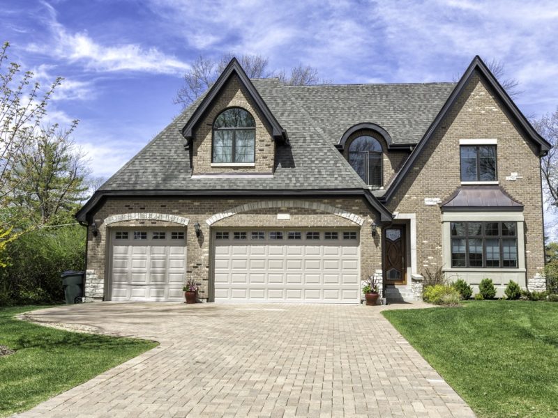 Traditional American Home with three car Garage